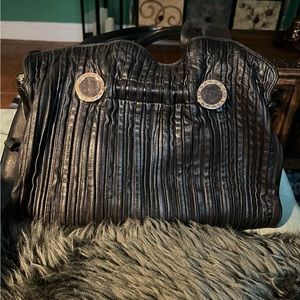 Bulgari pleated lambs leather purse.